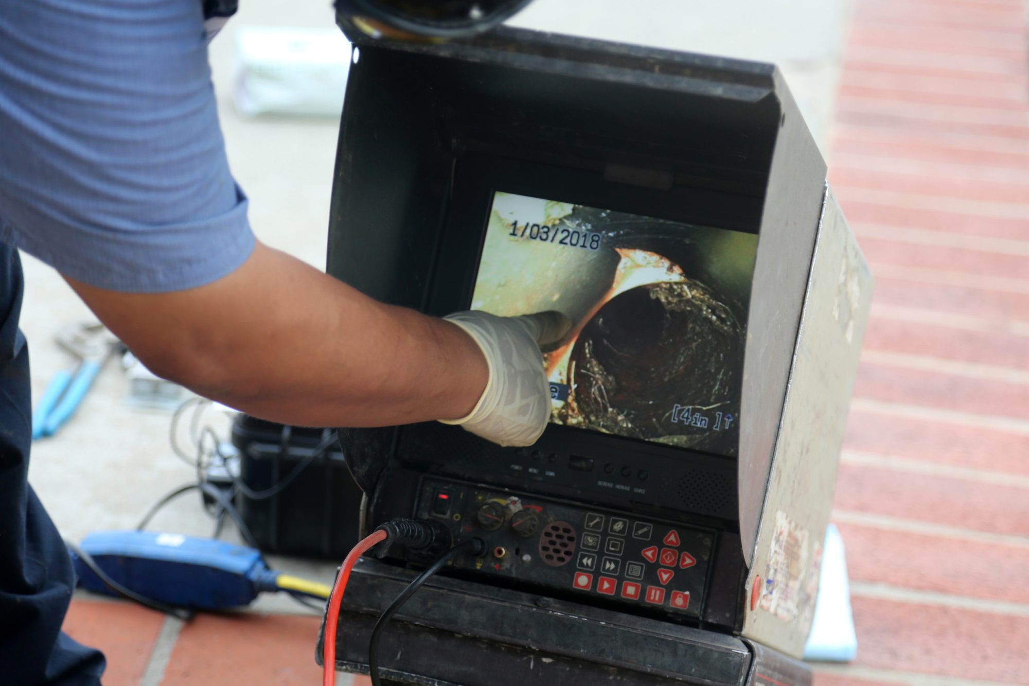 Plumbers sewer snake camera. a snake camera checks the inside of a sewer drain to make sure its clear of blockage and or damage. plumber snake. snake camera.